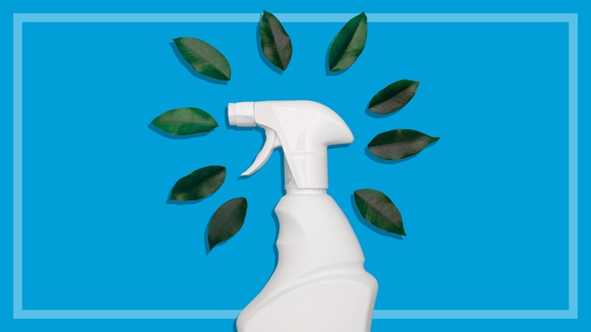 spray bottle surrounded by leaves